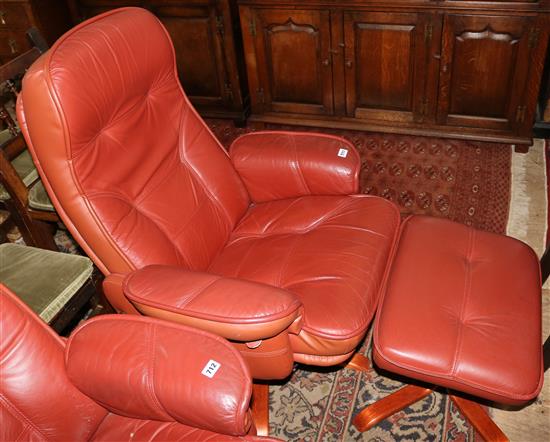 Mobel red leather upholstered swivelling and reclining armchairs and matching stool